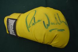Boxing interest, a single glove signed by the middleweight boxer Richie Woodhall.
