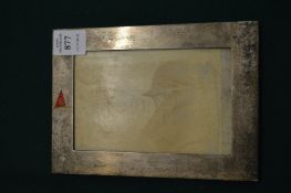 A good small silver photograph frame with enamelled flag depicting a V R and an anchor.
