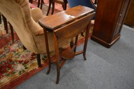 A drop-flap occasional table.