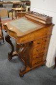A Victorian walnut Davenport.