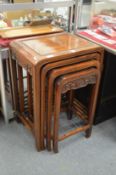 A good nest of four Chinese hardwood tables.