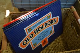 A collection of Old Holborn enamel signs.