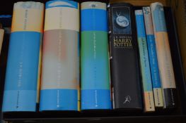 A collection of Harry Potter books.