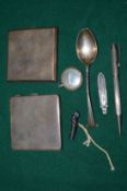 A group of silver items to include two cigarette cases.
