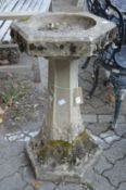 A good gothic revival reconstituted stone bird bath.