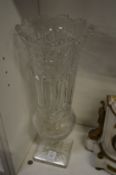 Cut glass vase.