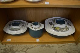 Three stylish Poole pottery serving dishes with covers.