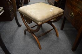 A Victorian rosewood and upholstered stool.
