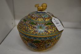 A Chinese cloisonne circular bowl and cover with lion finial.