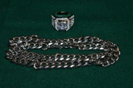 A heavy stainless steel necklace and a hip-hop style dress ring.