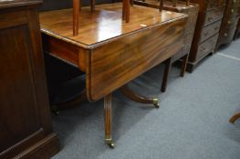 A 19th century mahogany pedestal pembroke table.
