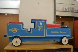 A childs painted wooden train.