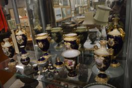 A collection of Coalport and similar items, rich gilt decoration painted with panels of