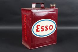 A VINTAGE ESSO PETROL CAN. 30cms high x 23cms wide.