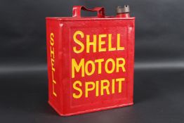 A VINTAGE SHELL PETROL CAN. 33cms high x 23cms wide.