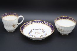 A FLIGHT WORCESTER SWIRL FLUTED TRIO.