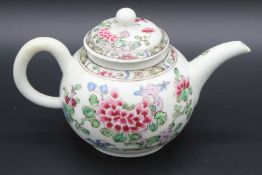 A BOW FAMILLE ROSE TEAPOT AAND COVER 1752-1754. 3ins high. Provenance: MERCURY ANTIQUES.