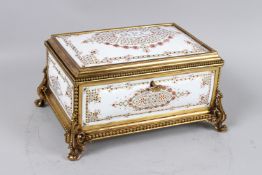 A GOOD GILT BRONZE AND WHITE ENAMEL SEWING BOX with initials MEC, with silk interior. 9ins wide.