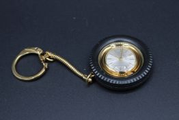 A GIRARD-PERREGAUX WATCH KEY RING, boxed.