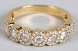 AN 18CT YELLOW GOLD, DIAMOND AND ROSE CUT DIAMOND RING.