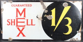 A VINTAGE SHELL-MEX ENAMEL ADVERTISING SIGN with 1/3 in a circle. 46cms x 90cms