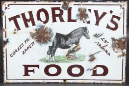 A RARE 19TH CENTURY OR EARLY 20TH CENTURY ENAMEL SIGN FOR THORLEY'S FOODS for horses. The sign shows