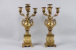 A VERY GOOD PAIR OF LOUIS XVITH CAST GILT BRONZE FOUR LIGHT CANDELABRA with classical figures,