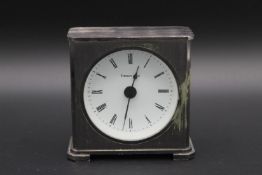 A TIFFANY & CO CLOCK, 3ins high. in a Tiffany & Co box.