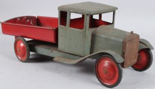 A TINPLATE TIP UP LORRY. 50cms long.