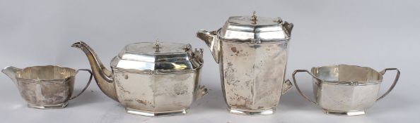 A GOOD ART DECO SILVER FOUR PIECE TEA SET comprising teapot, hot water jug, sugar basin and milk