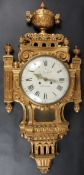 A LARGE LOUIS XVI STYLE CARVED GILTWOOD CARTEL CLOCK by O. LJUNGDAHL, STOCKHOLM, with a white