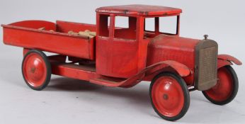 A TRI-ANG TIN PLATE TIP UP LORRY. 50cms long.