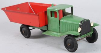 A TRI-ANG RED AND GREEN FARM LORRY. 33cms long.