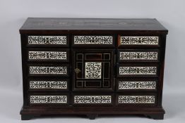 A GOOD 18TH CENTURY ITALIAN TABLE CABINET with bone panels and fitted with a central panel door,