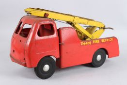A TRI-ANG FIRE ENGINE with yellow ladder. 40cms long.