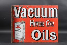 A VINTAGE VACUUM MOTOR CAR OILS double-sided enamel sign with a can of Gargoyle oil. 40cms x 51cms.