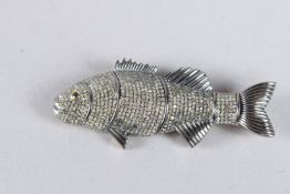 A GOOD DIAMOND AND BLUE ENAMEL FISH BROOCH.