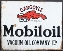 A VINTAGE GARGOYLE MOBILOIL DOUBLE-SIDED ENAMEL SIGN. Vacuum Oil Company Ltd, with red gargoyle
