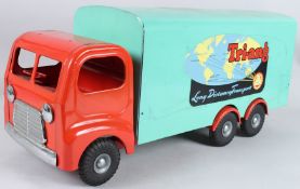 A LARGE TRI-ANG LONG DISTANCE TRANSPORT LORRY with red cab and wheel arches. 60cms long x 25cms