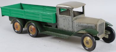 A TIN PLATE No. 140 WIND-UP PICK UP TRUCK. 50cms long.