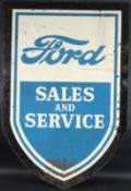A VINTAGE FORD SALES & SERVICE BLUE AND WHITE SHIELD SHAPED DOUBLE-SIDED ENAMEL SIGN. 107cms x