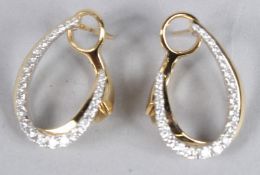 A PAIR OF 18CT YELLOW, WHITE GOLD AND DIAMOND HOOP EARRINGS.
