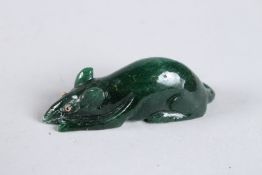 A RUSSIAN JADE RAT with gold eyes. 2.5ins in a Faberge box.