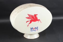 A MOBIL RACING OIL OVAL PLASTIC PETROL PUMP GLOBE. 33cms x 46cms.