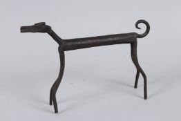 A MID CENTURY ITALIAN BRUTALIST WROUGHT IRON SCULPTURE OF A DOG. 4.5ins x 6.5ins.