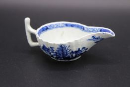 A SMALL DERBY BLUE AND WHITE SAUCER. 4ins long.