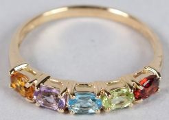 AN 18CT YELLOW GOLD, MULTI0-GEM SET RING.