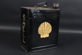 A VINTAGE SHELL 3/1 PETROL CAN. 30cms high x 23cms wide.