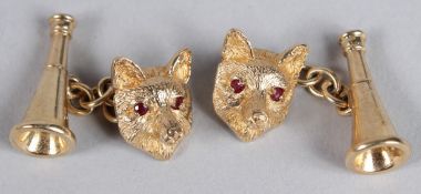 A PAIR OF 9CT GOLD FOX HEAD, HUNTING HORN AND RUBY SET CUFFLINKS.