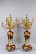 A SUPERB PAIR OF LOUIS XVITH GILT BRONZE AND MARBLE SIX BRANCH CANDELABRA with scrolling branches,